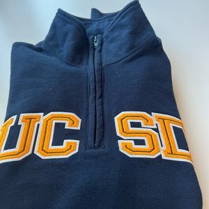 UCSD half zip jacket made by Champion.